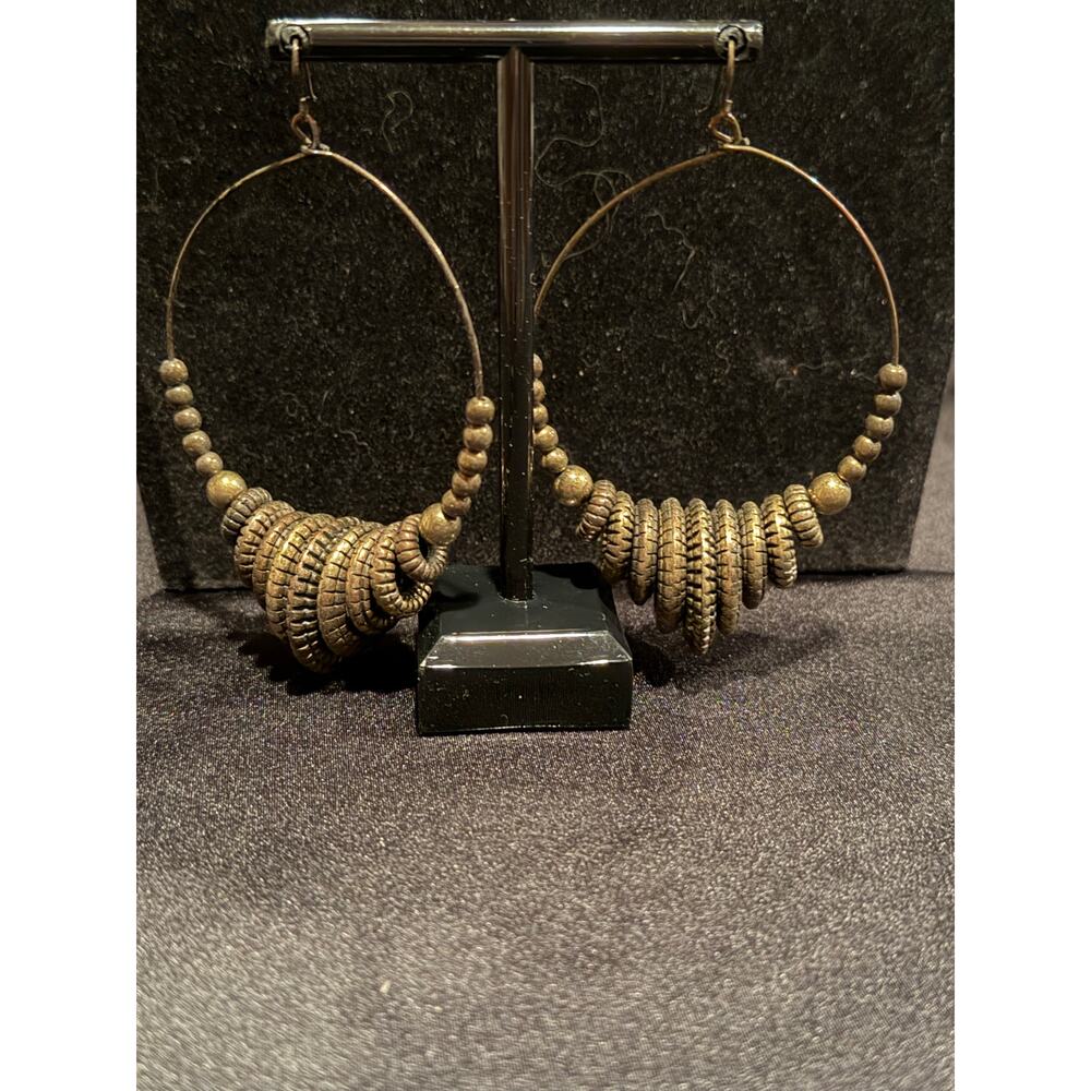 Brass tone large hoop earrings stacked metallic rings and beads